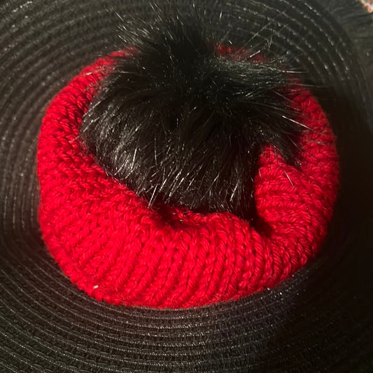 Red beanie with black pompom